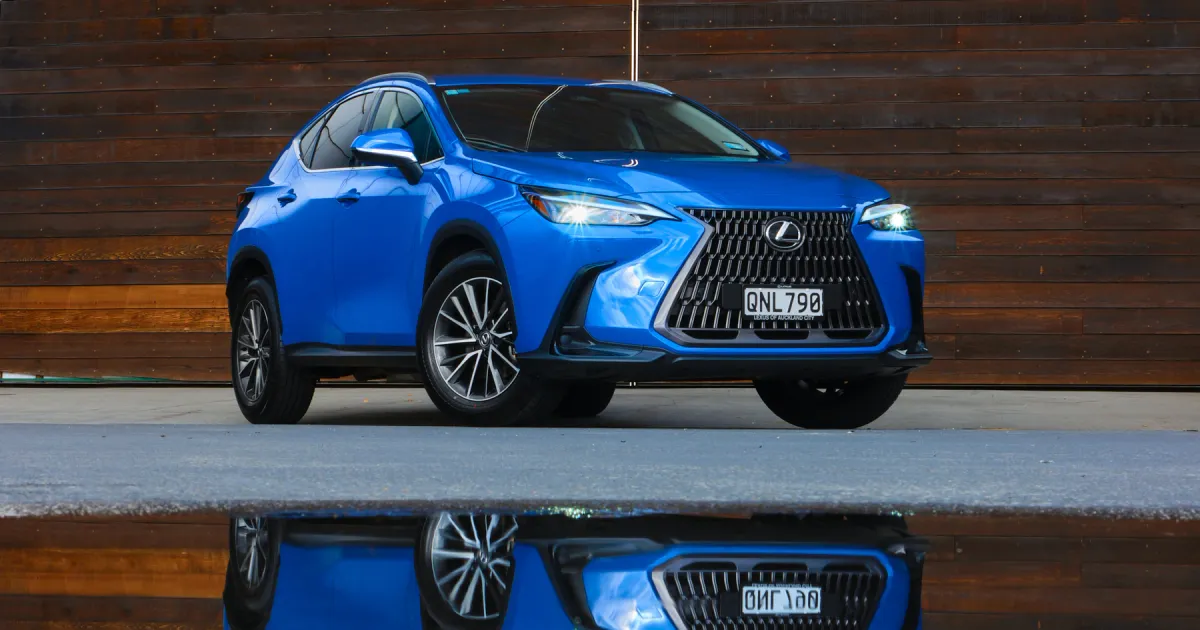 Blue SUV displayed outside a dealership